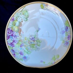 Artist signed hand painted flower plate with gold rim